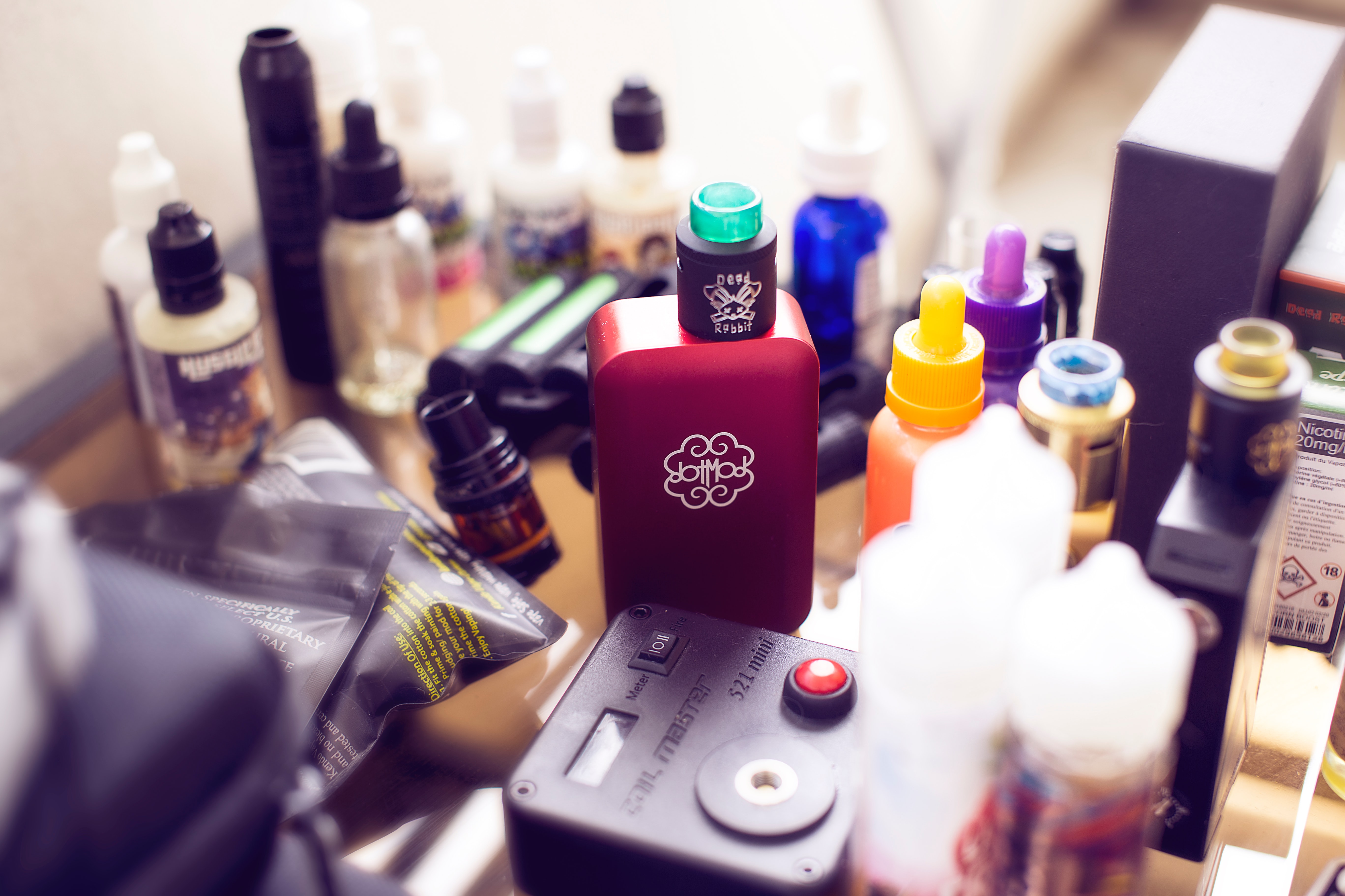 collection of vaping products on a desk