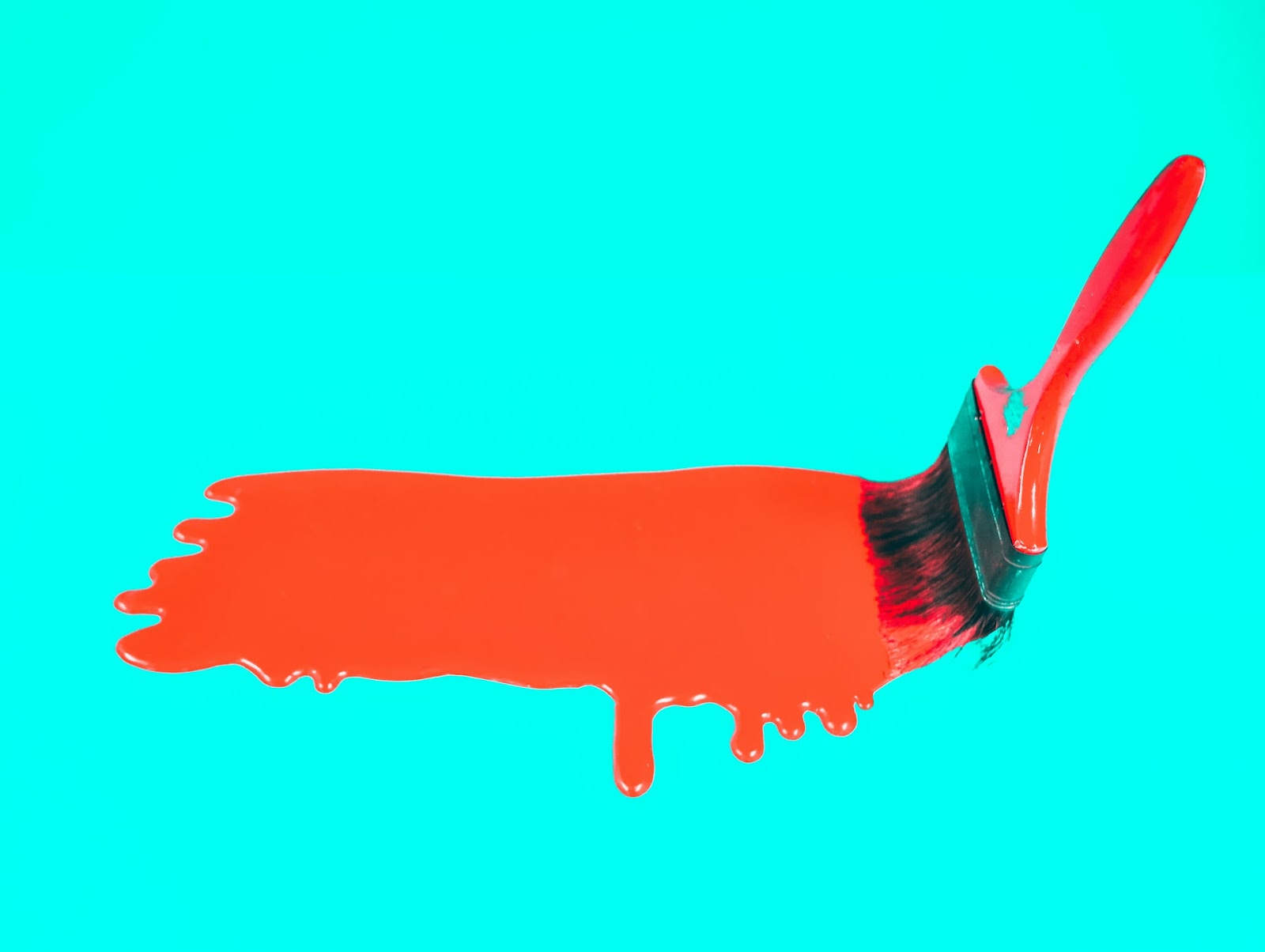 blue background red paint splash brush